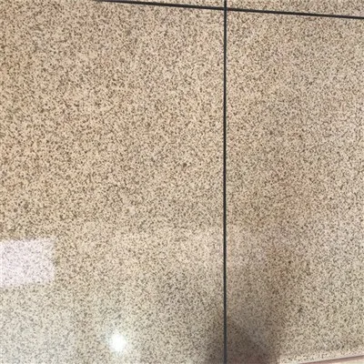 Auksu kepta tešla susukama granito grindų danga